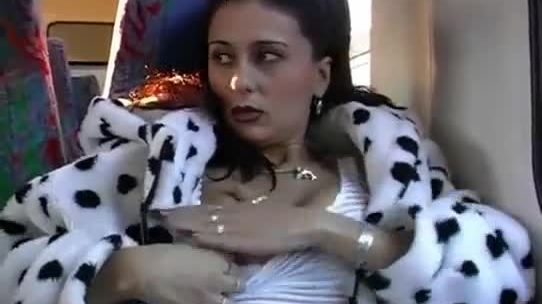 Stroking her pussy while sitting on the bus